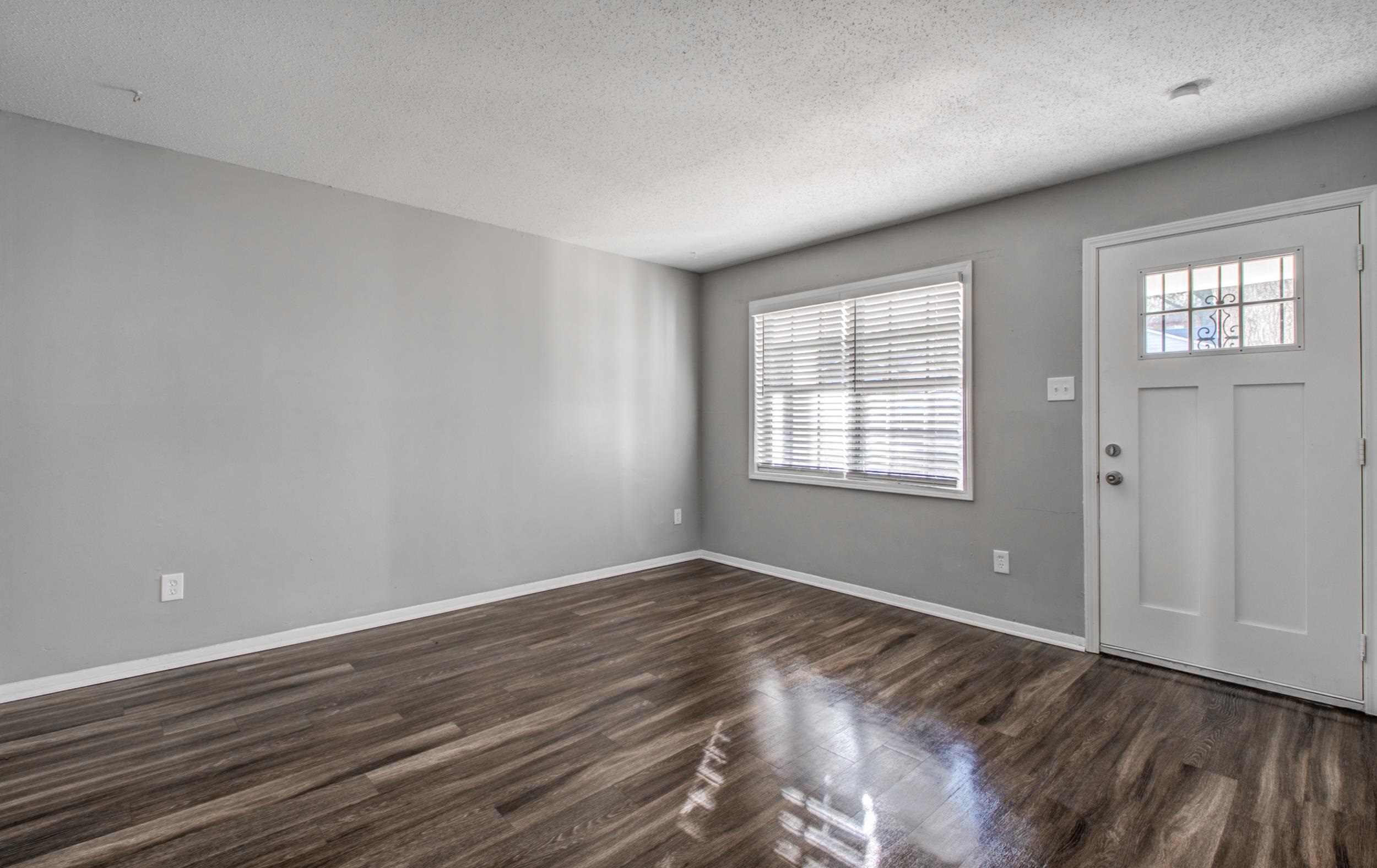 4174 Hobson Road Memphis, TN 38128 - Photo 4 of 24 Entryway with a textured ceiling and dark wood-style flooring