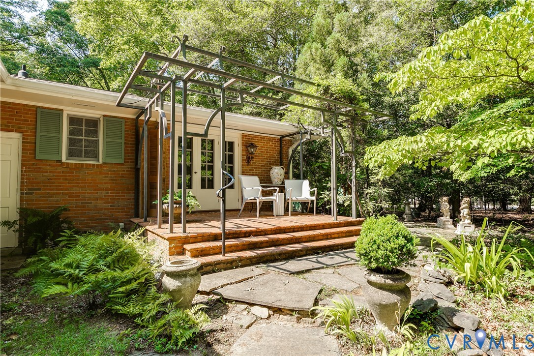 10475 Cherokee Road Richmond, VA 23235 - Photo 42 of 74 Patio off of primary bedroom with custom made perg