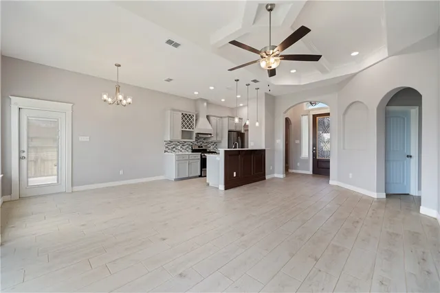 a view of a kitchen with a sink and a kitchen