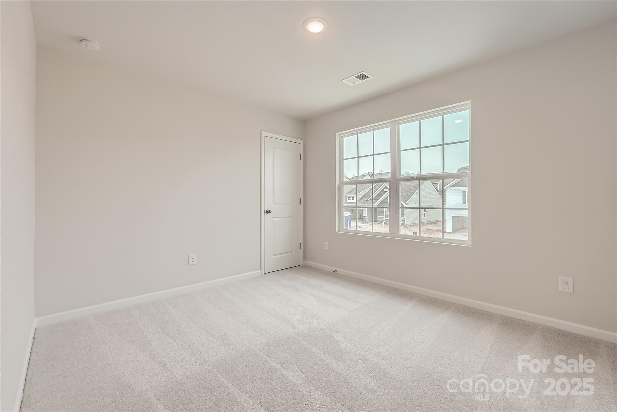1187 Blackburn Circle Edgemoor, SC 29712 - Photo 10 of 14 an empty room with a window