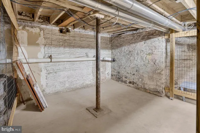 a front view of a residential apartment building with a yard