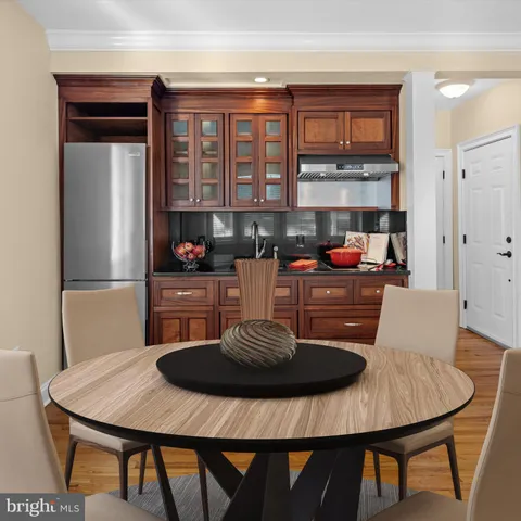 a table and chairs in a kitchen