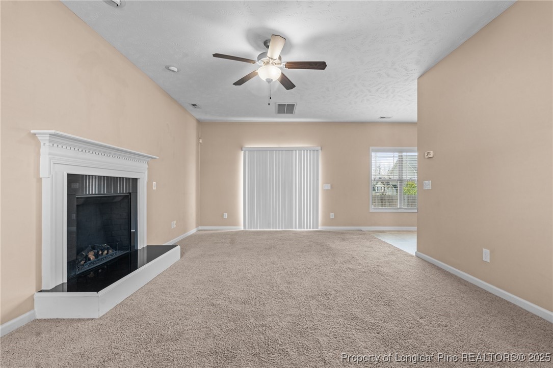 43 Battery Way Bunnlevel, NC 28323 - Photo 17 of 50 a view of an empty room with a window