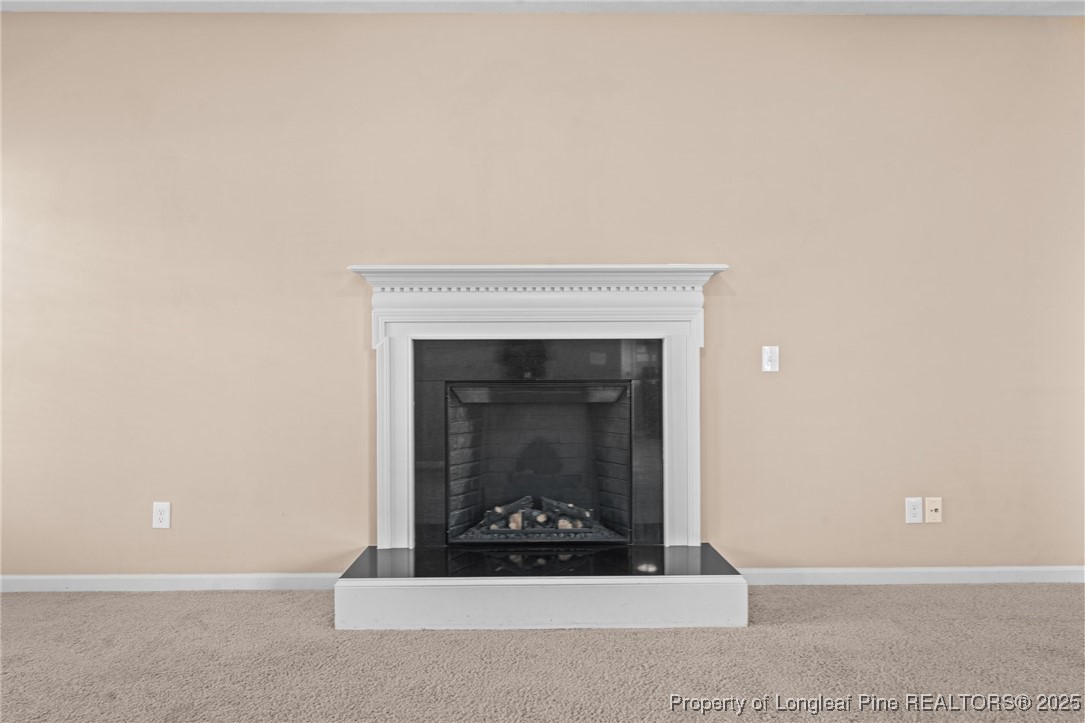 43 Battery Way Bunnlevel, NC 28323 - Photo 20 of 50 a living room with a fireplace