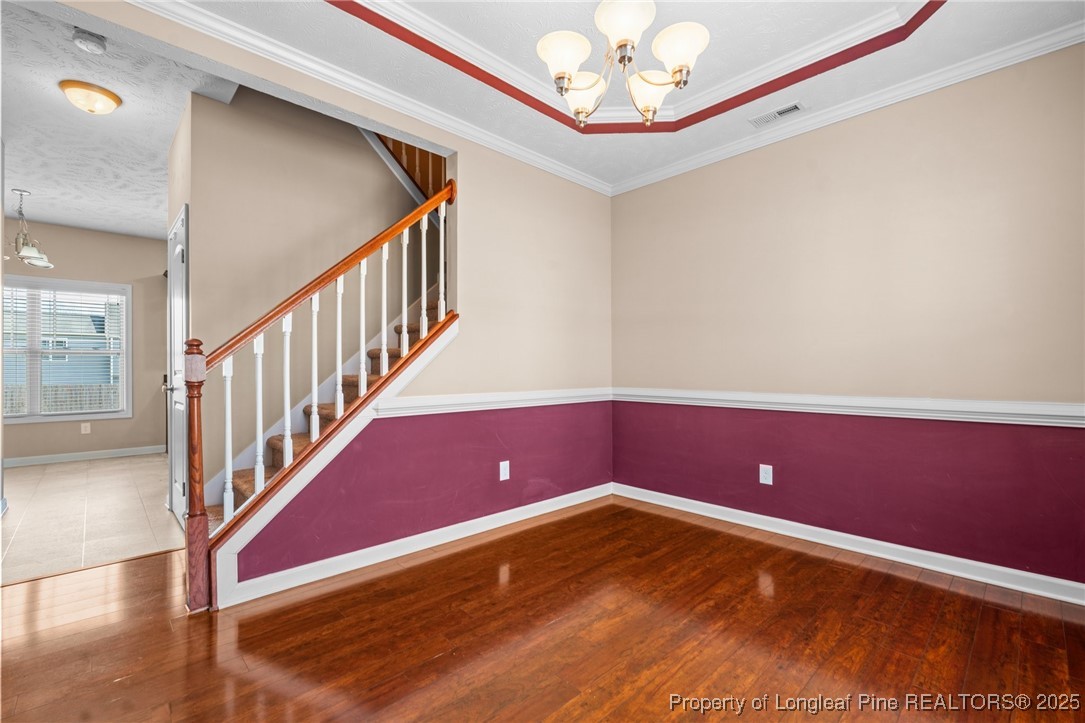 43 Battery Way Bunnlevel, NC 28323 - Photo 30 of 50 a view of room with stairs and wooden floor