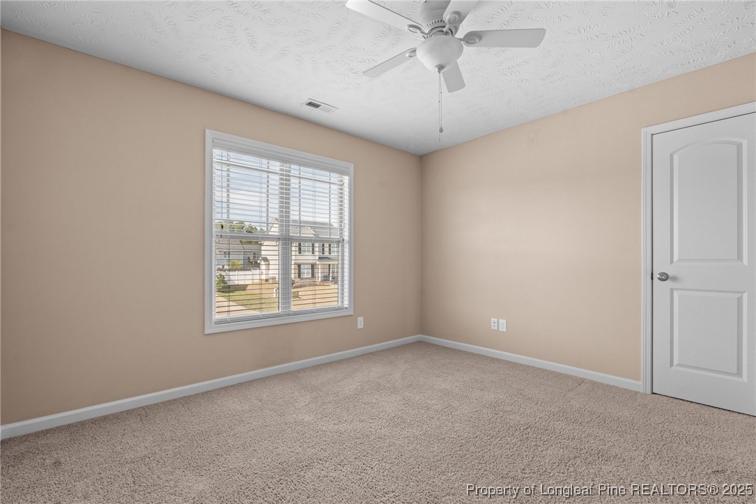 43 Battery Way Bunnlevel, NC 28323 - Photo 36 of 50 an empty room with a window