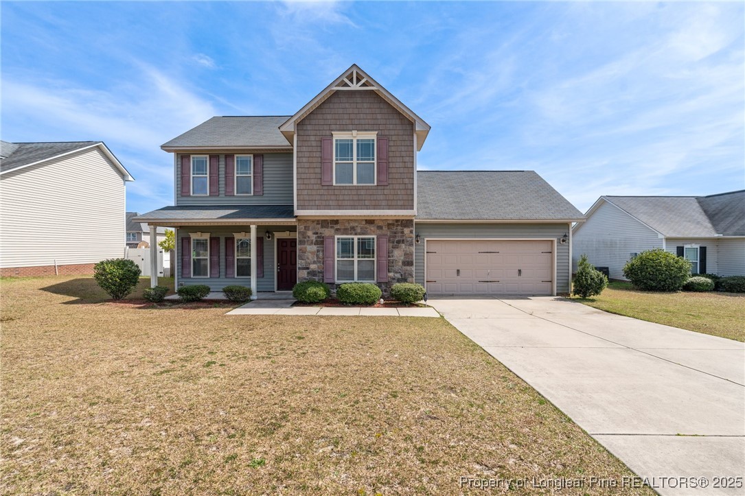 43 Battery Way Bunnlevel, NC 28323 - Photo 4 of 50 a front view of a house with yard