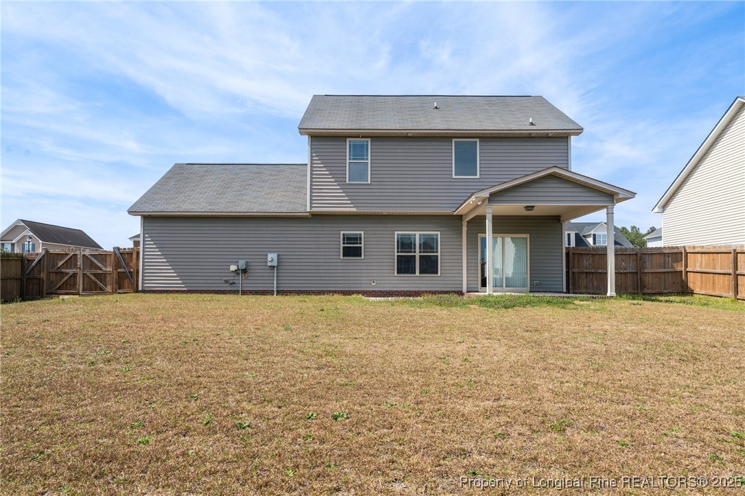43 Battery Way Bunnlevel, NC 28323 - Photo 46 of 50 a front view of a house with a yard