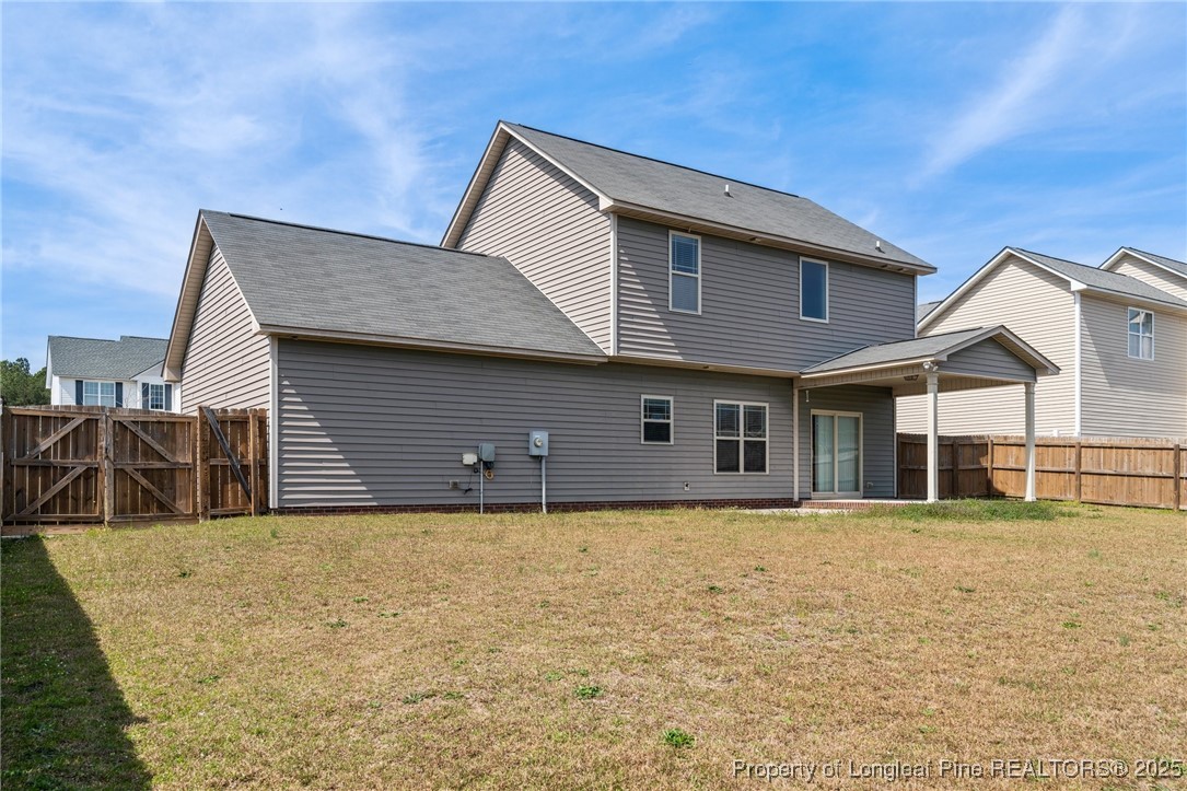 43 Battery Way Bunnlevel, NC 28323 - Photo 47 of 50 a front view of a house with a yard