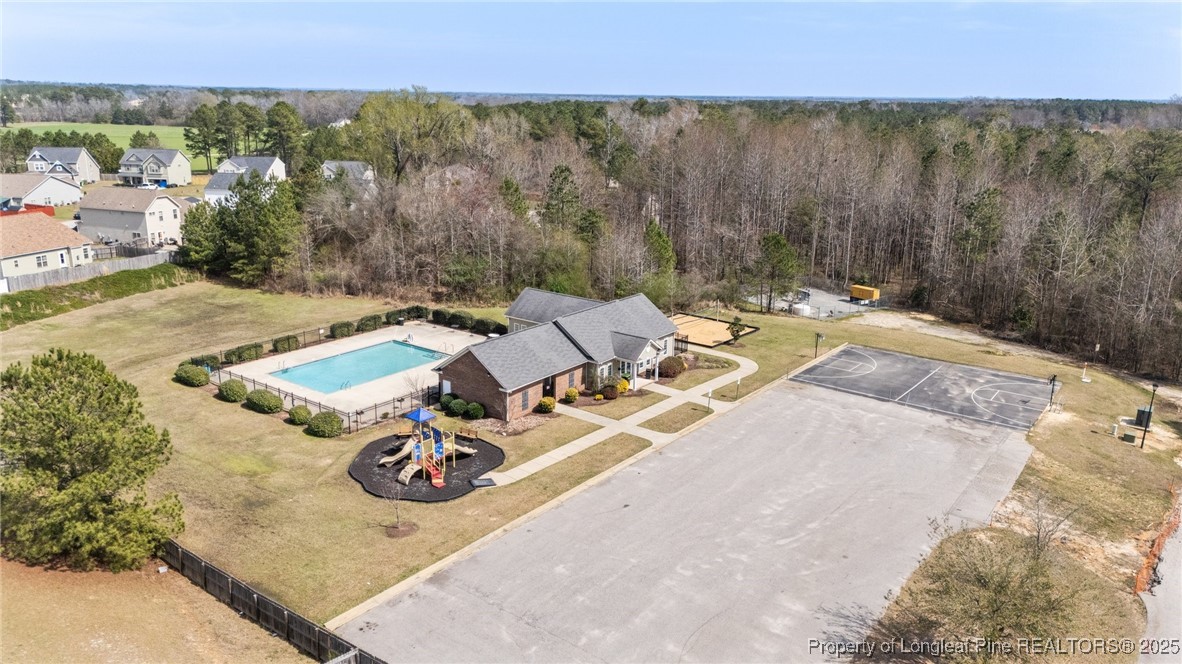 43 Battery Way Bunnlevel, NC 28323 - Photo 8 of 50 an aerial view of a house with swimming pool and mountain view