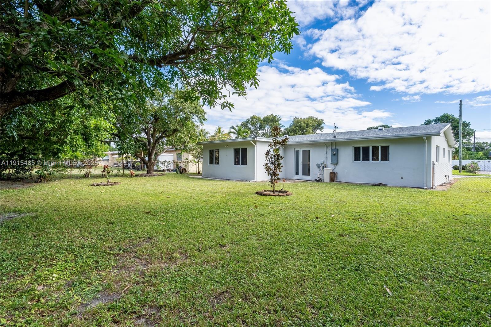 2631 Northwest 47th Avenue Lauderhill, FL 33313 - Photo 7 of 10 a view of a house with a backyard