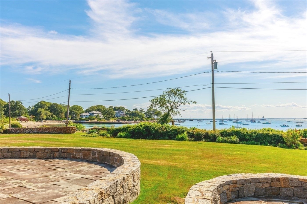 100 Eastern Point Boulevard Gloucester, MA 01930 - Photo 13 of 22 a view of a swimming pool and a yard