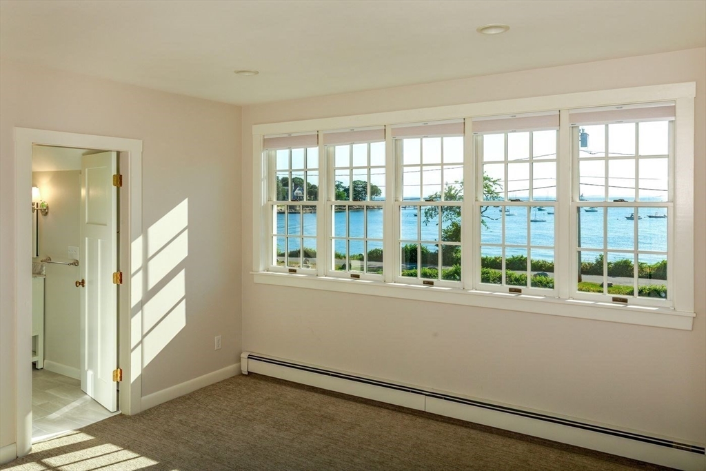 100 Eastern Point Boulevard Gloucester, MA 01930 - Photo 16 of 22 a view of an empty room with a window