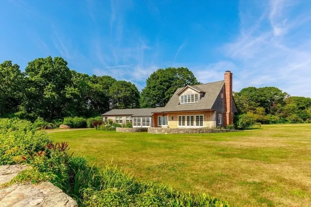 a view of a house with a big yard