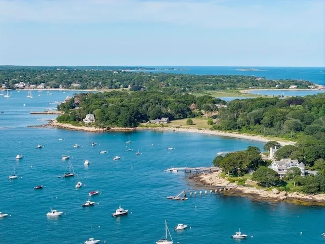 a view of a lake with a yard