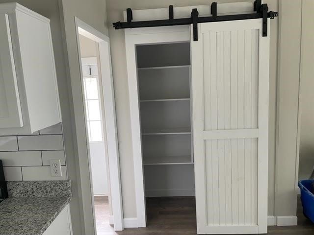 860 Thanksgiving Fire Road Selma, NC 27576 - Photo 14 of 23 Pantry w/ Barn Doors