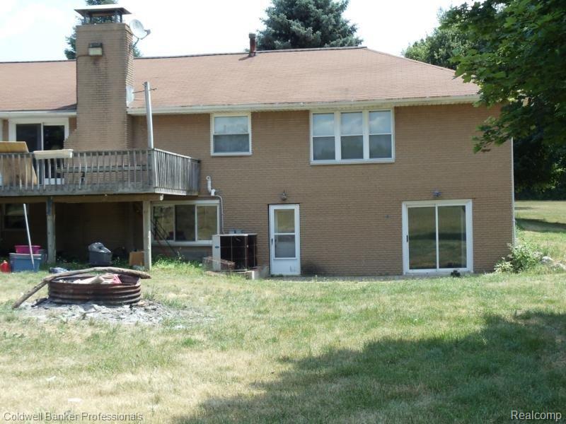 15566 Falk Road Holly, MI 48442 - Photo 17 of 20 REAR OF HOME