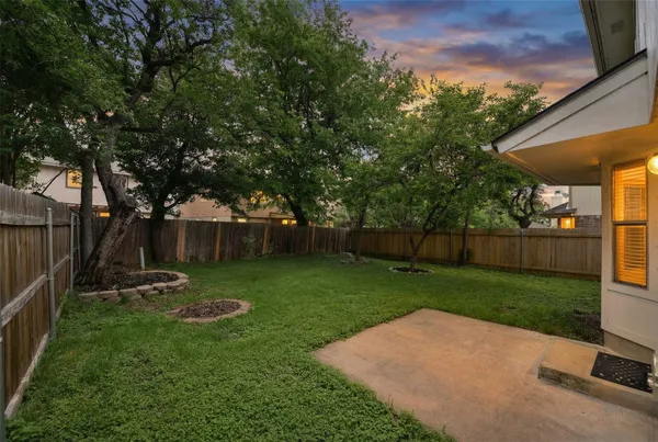 a backyard of a house with lots of green space