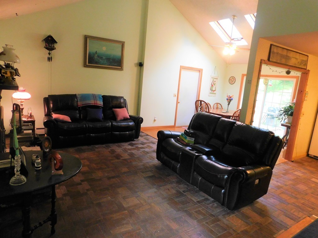 314 Main Road Westhampton, MA 01027 - Photo 15 of 25 a living room with furniture and a mirror