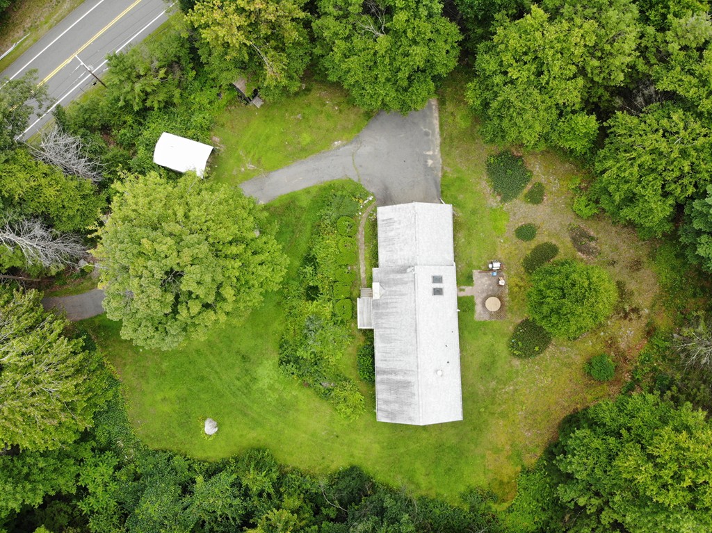 314 Main Road Westhampton, MA 01027 - Photo 23 of 25 an aerial view of a house with a yard and large trees