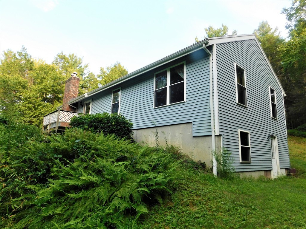 314 Main Road Westhampton, MA 01027 - Photo 3 of 25 a house that has a lot of plants in it