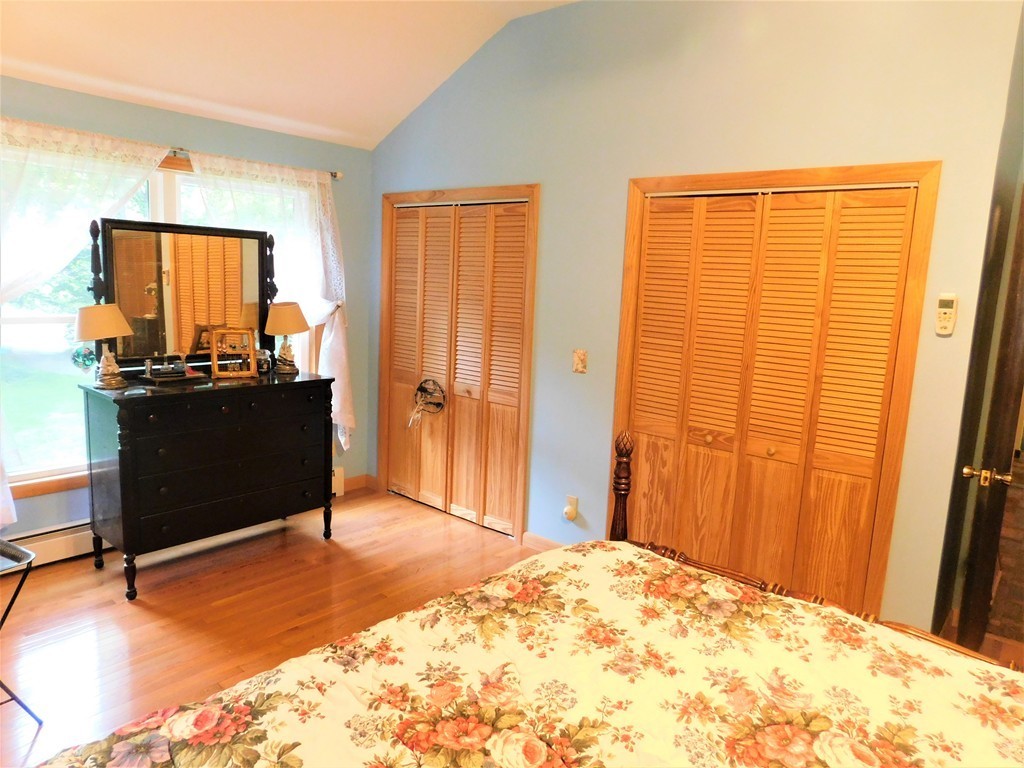 314 Main Road Westhampton, MA 01027 - Photo 8 of 25 a bedroom with a bed and a dresser