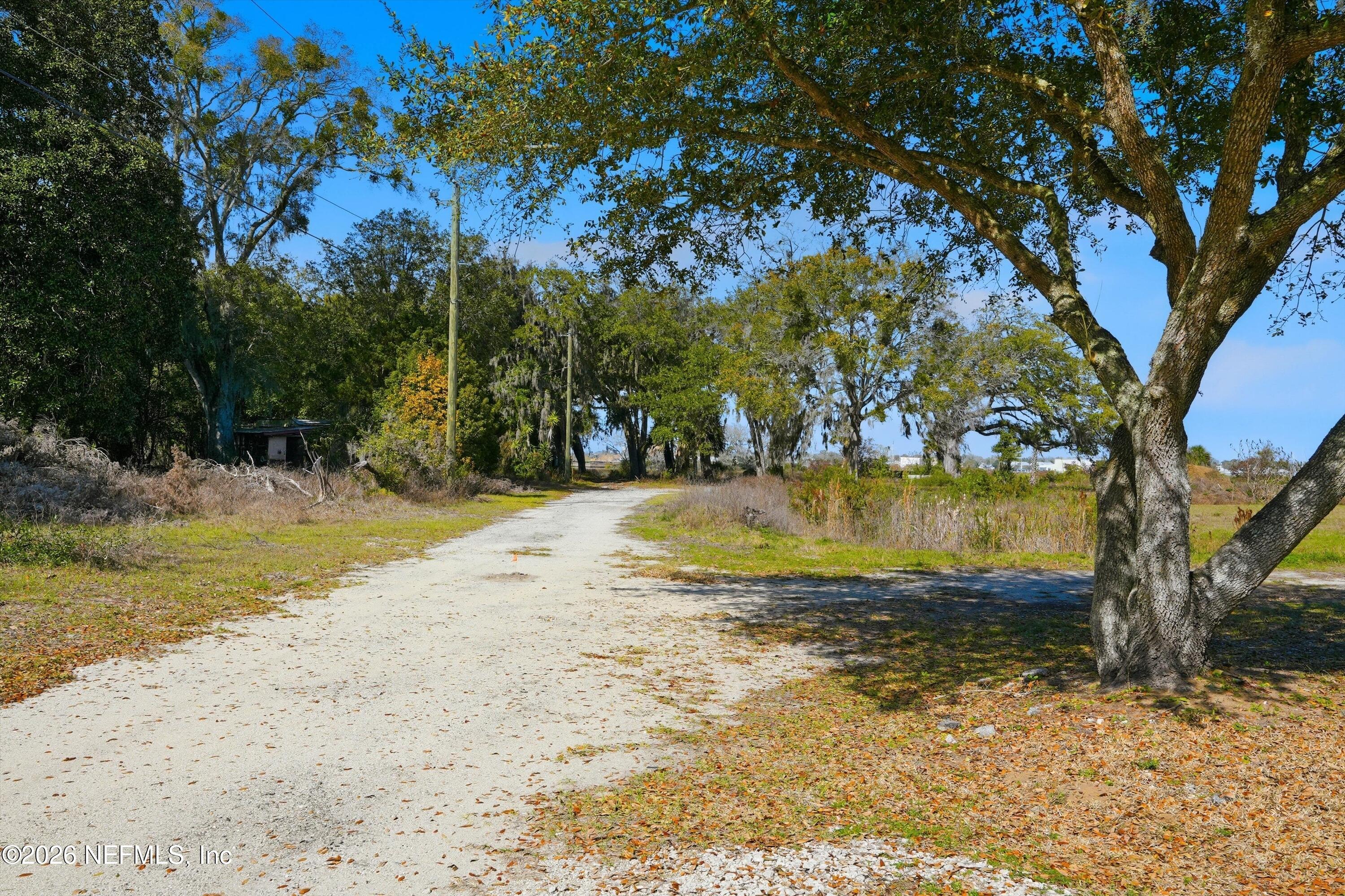200 Nix Boat Yard Road St. Augustine, FL 32084 - Photo 2 of 8 a view of swimming pool with a yard