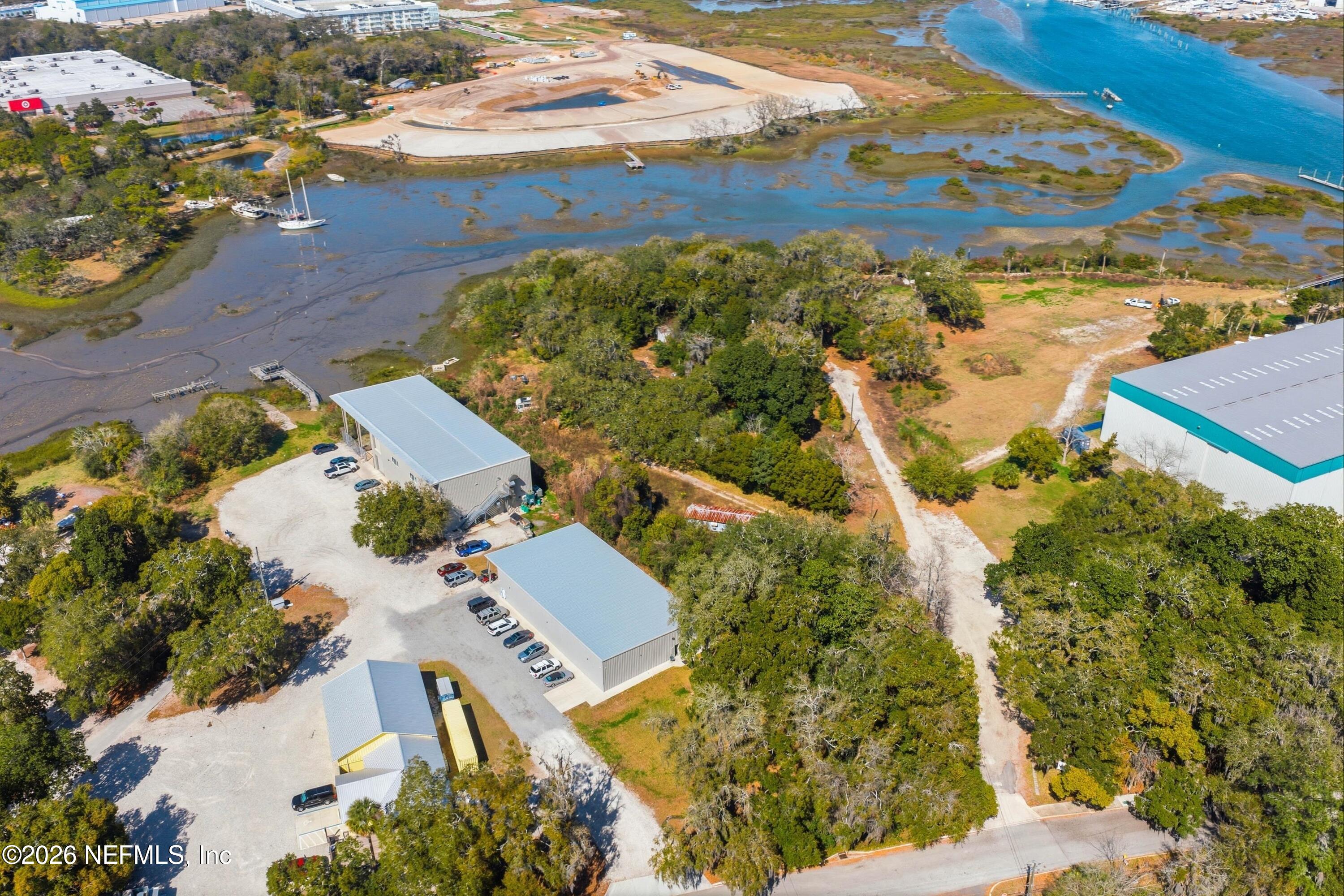 200 Nix Boat Yard Road St. Augustine, FL 32084 - Photo 6 of 8 an aerial view of a house with a yard