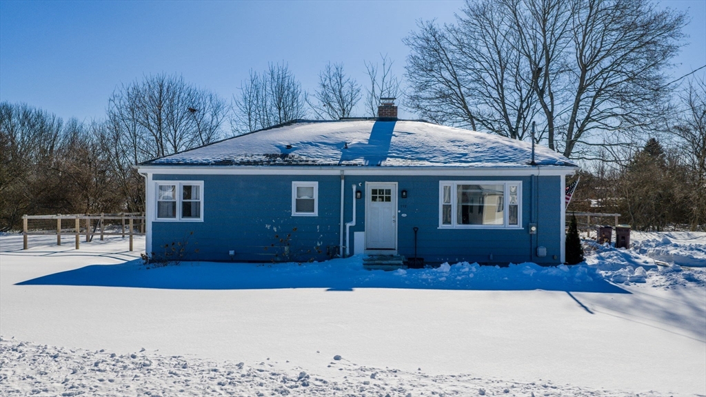 112 Lawson Avenue Acushnet, MA 02743 - Photo 1 of 28 a front view of a house with a garden and yard