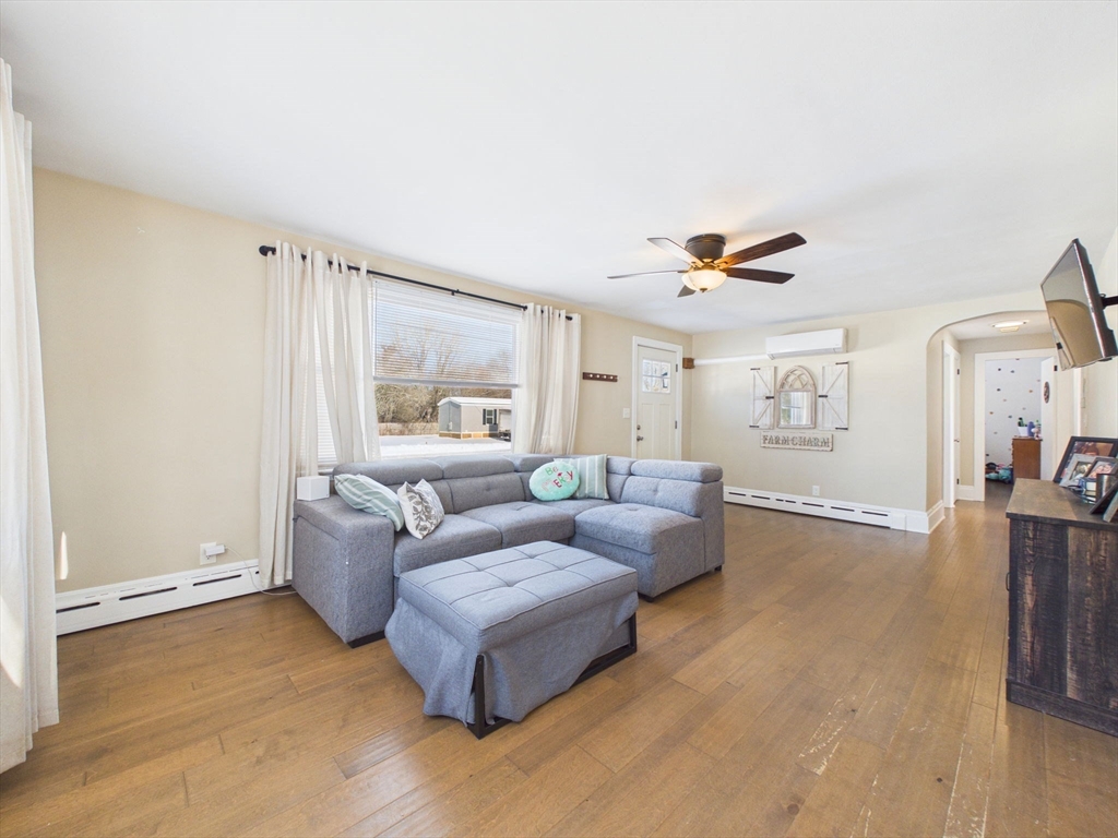 112 Lawson Avenue Acushnet, MA 02743 - Photo 11 of 28 a living room with furniture and a large window