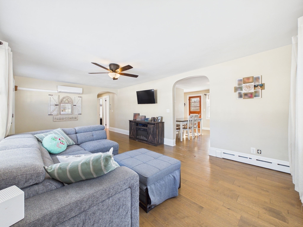 112 Lawson Avenue Acushnet, MA 02743 - Photo 13 of 28 a living room with furniture and a flat screen tv