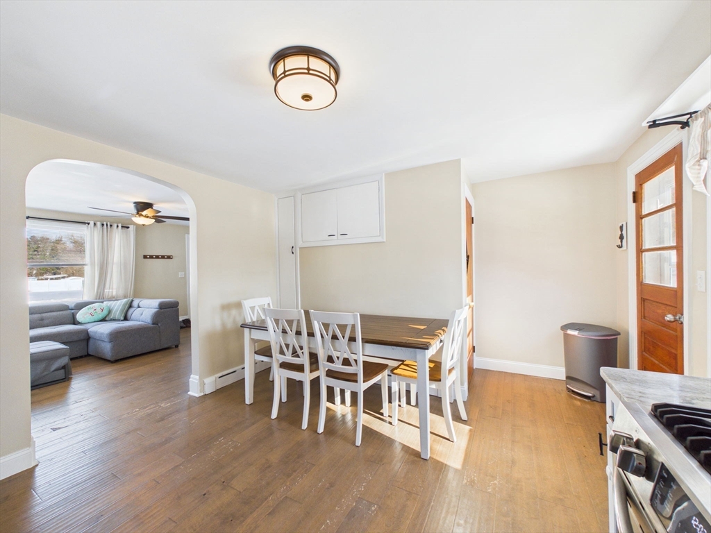112 Lawson Avenue Acushnet, MA 02743 - Photo 17 of 28 a view of a dining room with furniture and wooden floor