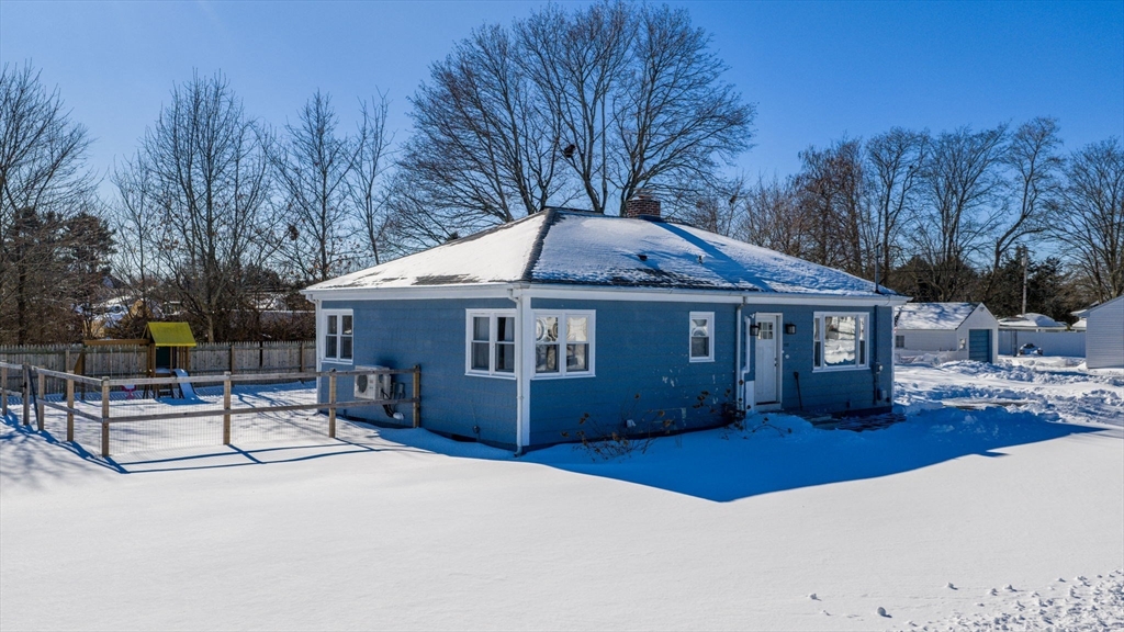 112 Lawson Avenue Acushnet, MA 02743 - Photo 2 of 28 a front view of a house with a yard and garage