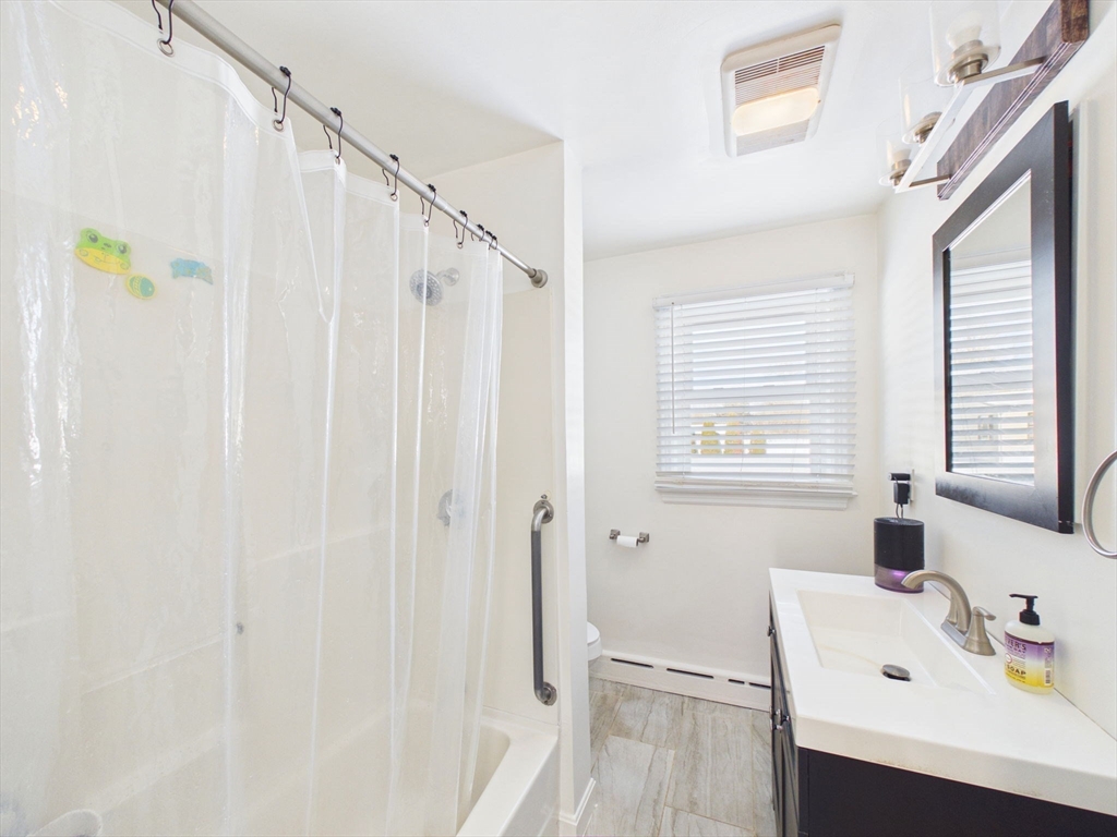 112 Lawson Avenue Acushnet, MA 02743 - Photo 22 of 28 a bathroom with a sink a window and shower