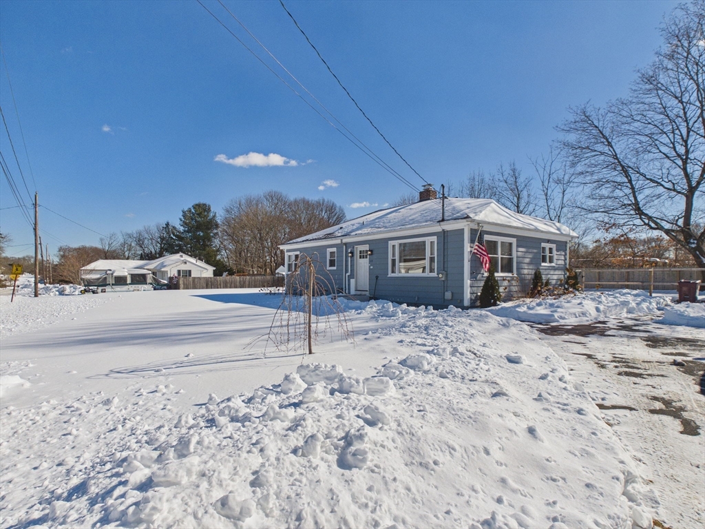 112 Lawson Avenue Acushnet, MA 02743 - Photo 4 of 28 a front view of a house with a yard