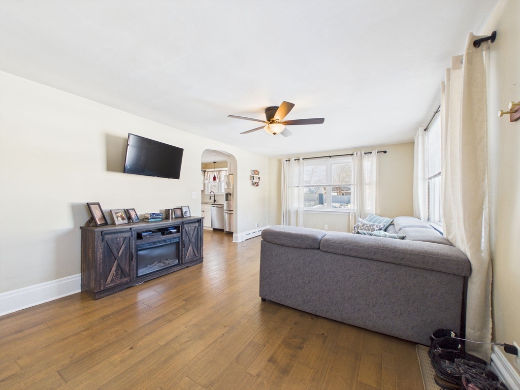112 Lawson Avenue Acushnet, MA 02743 - Photo 8 of 28 a living room with furniture and a flat screen tv
