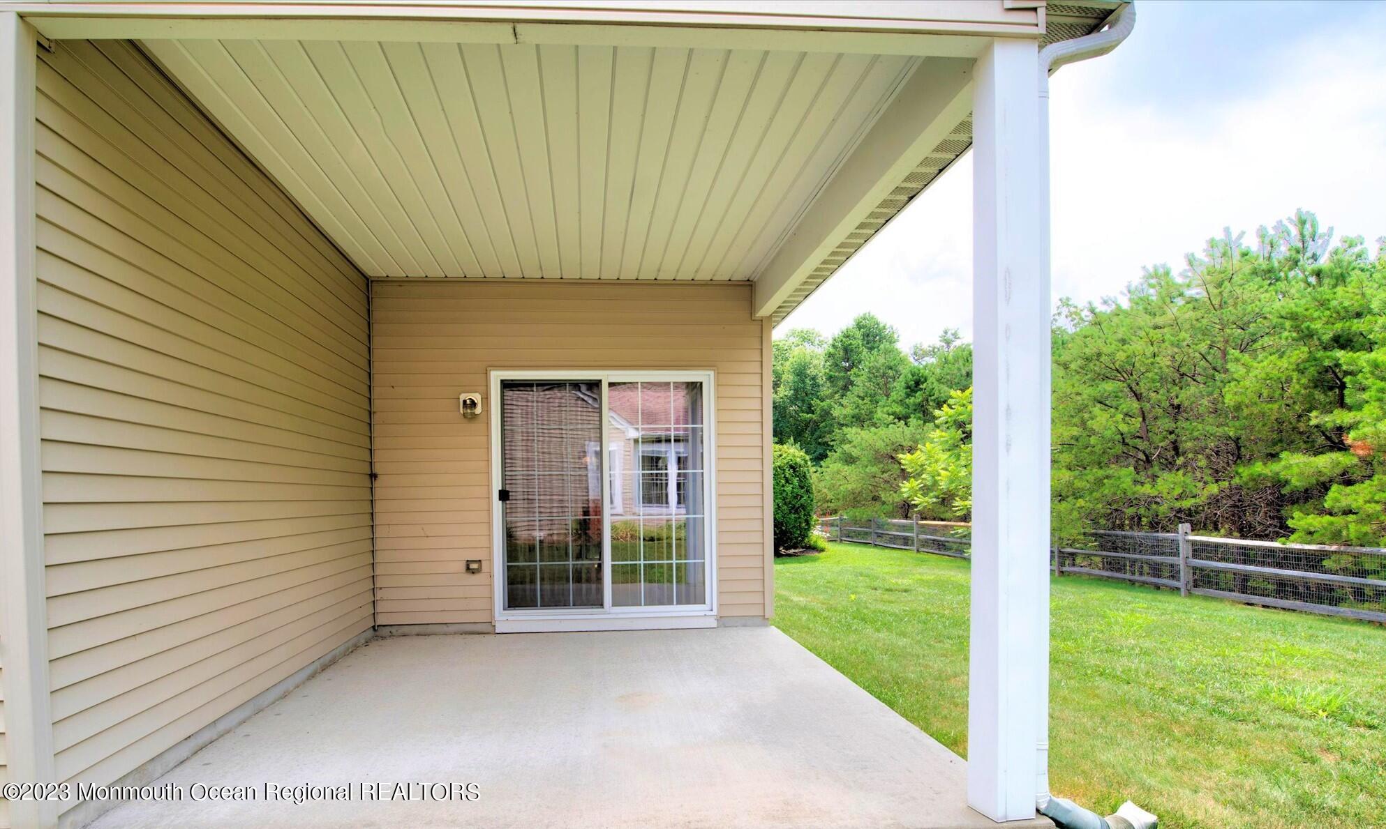 55 Pebble Beach Boulevard Jackson, NJ 08527 - Photo 29 of 53 a view of a backyard with garden