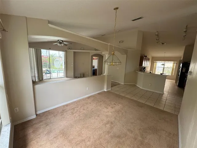 a view of swimming pool with a patio