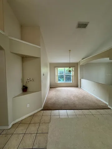 a house with swimming pool in front of it