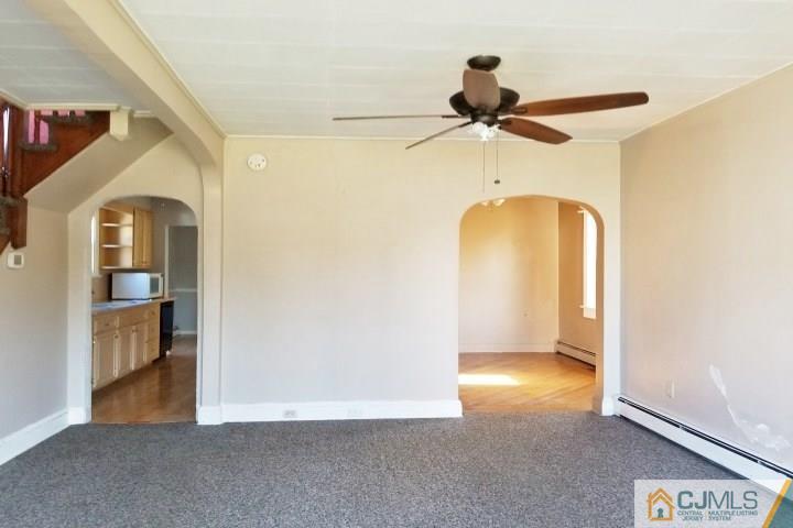 37 Meadow Road Edison, NJ 08817 - Photo 14 of 22 a view of a hallway with a chandelier