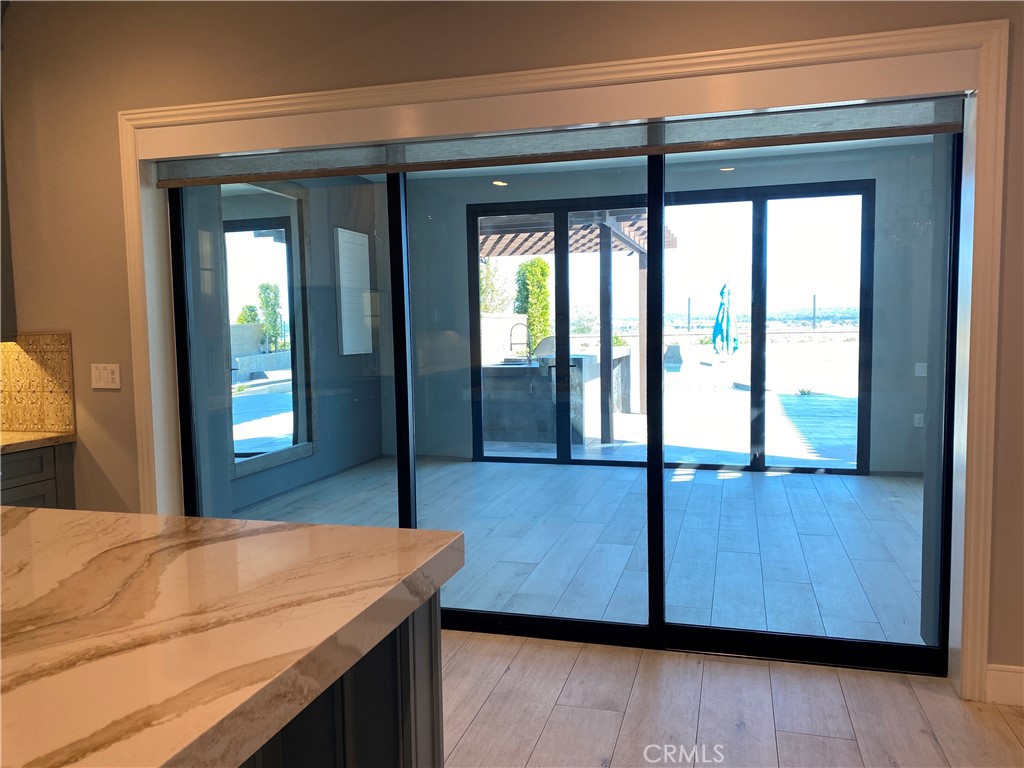 107 Iron Gate Irvine, CA 92618 - Photo 12 of 37 a room with a balcony and balcony