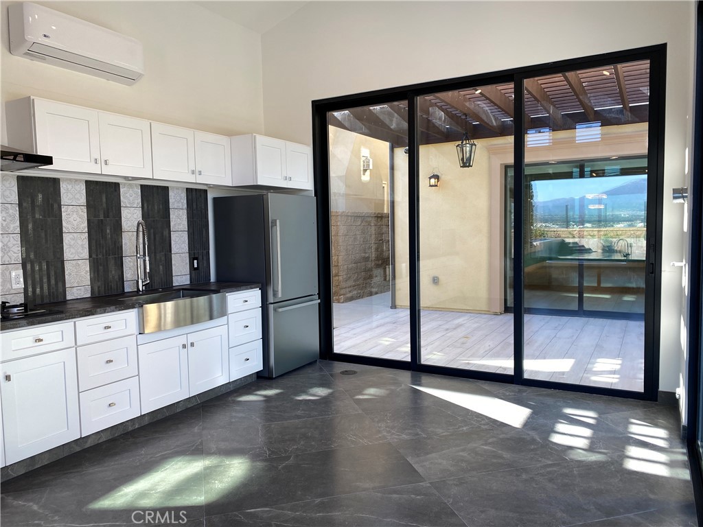107 Iron Gate Irvine, CA 92618 - Photo 34 of 37 a view of a large window with wooden walls