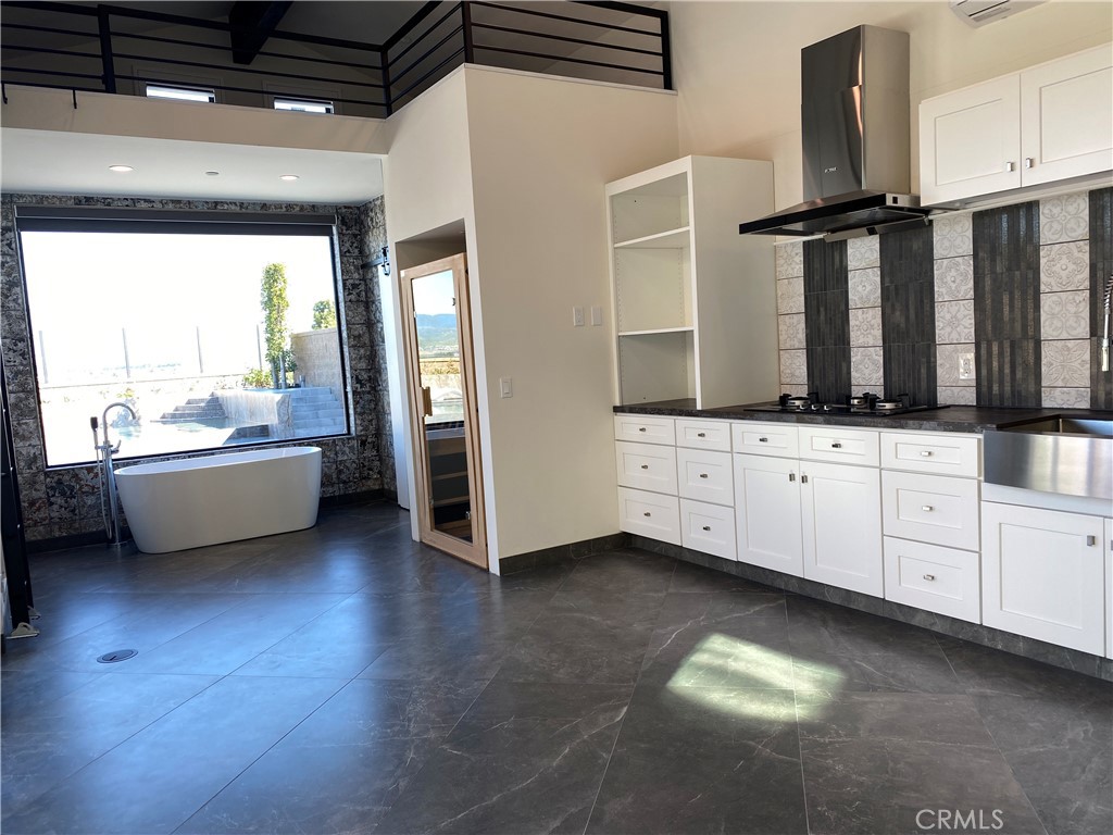 107 Iron Gate Irvine, CA 92618 - Photo 37 of 37 a bathroom with a sink and a mirror