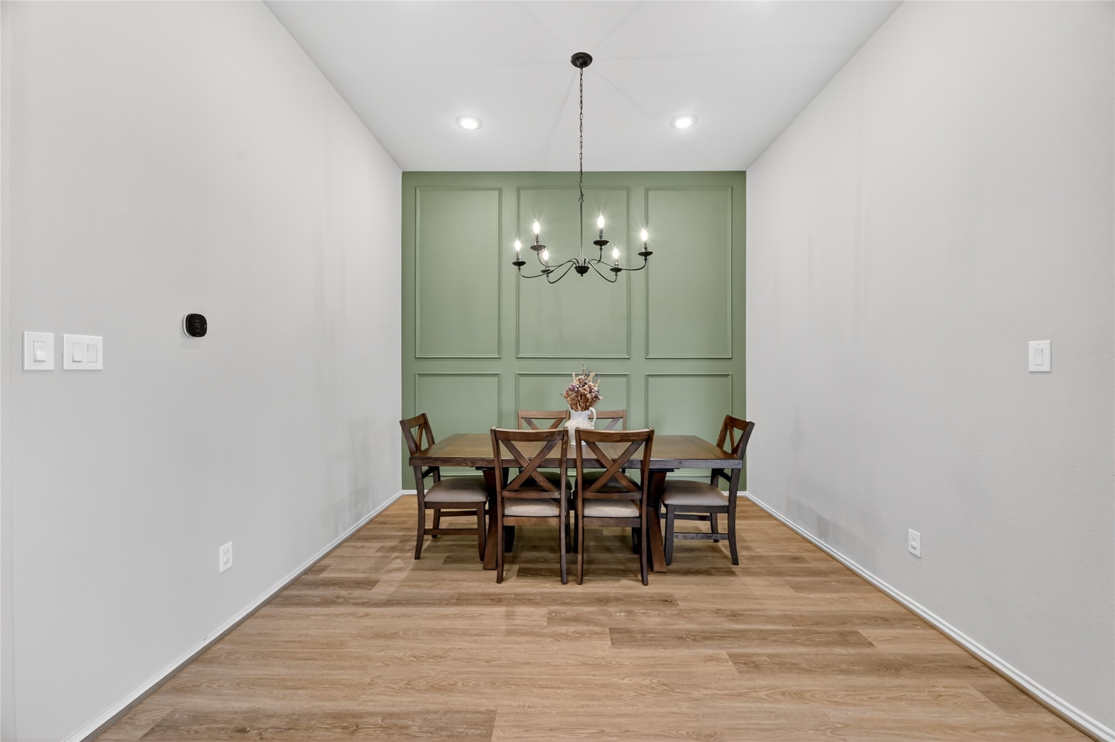 4731 Cedar Butte Lane Manvel, TX 77578 - Photo 13 of 42 a view of a dining room with furniture and chandelier