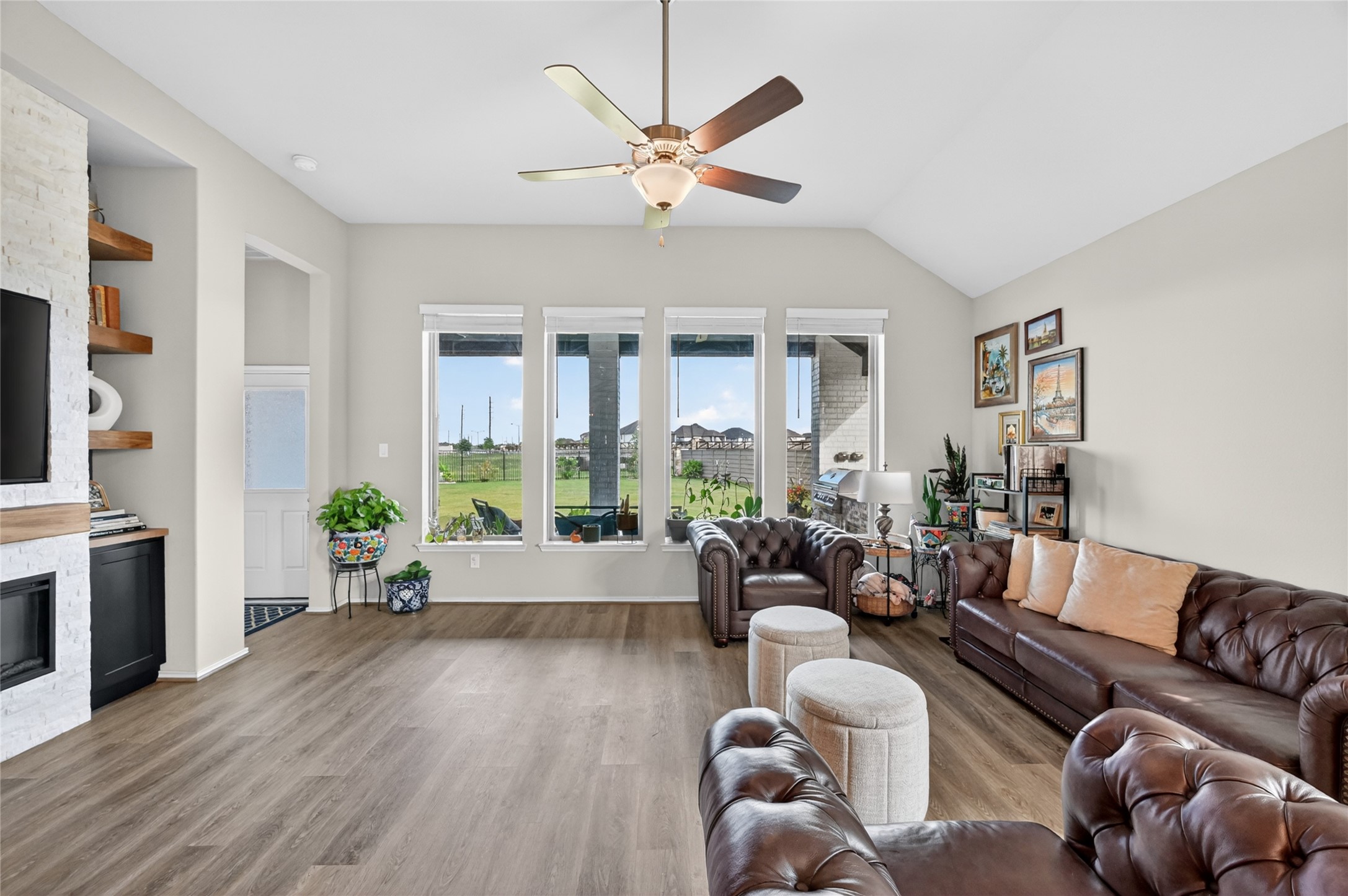 4731 Cedar Butte Lane Manvel, TX 77578 - Photo 16 of 42 a living room with furniture and wooden floor
