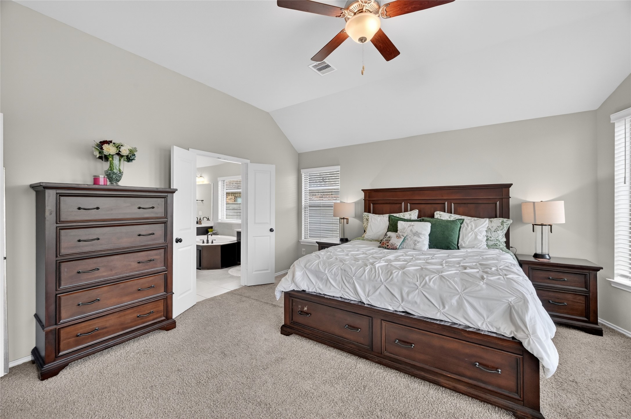 4731 Cedar Butte Lane Manvel, TX 77578 - Photo 22 of 42 a bedroom with a bed and ceiling fan