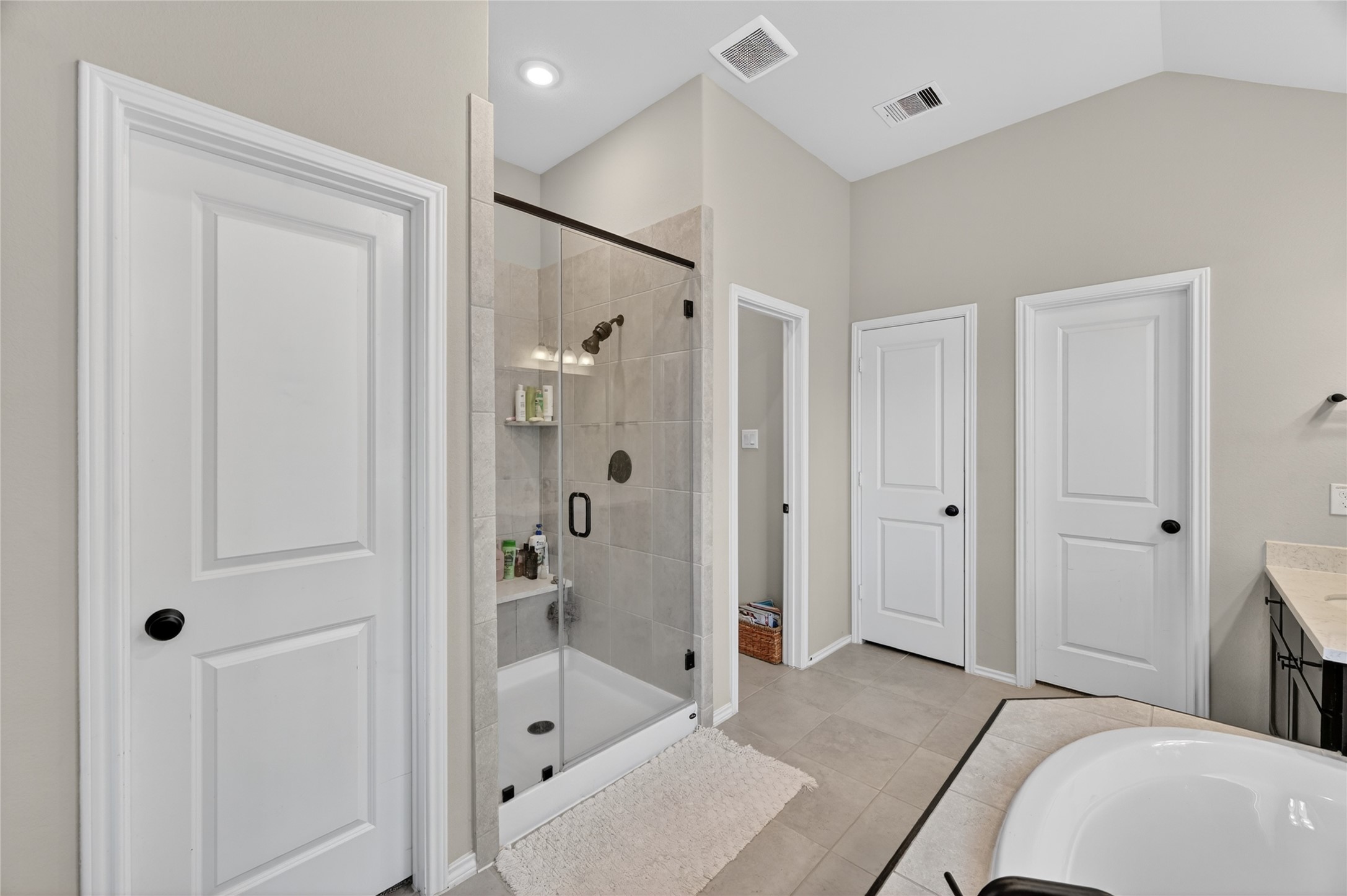 4731 Cedar Butte Lane Manvel, TX 77578 - Photo 24 of 42 a spacious bathroom with a bathtub shower and toilet