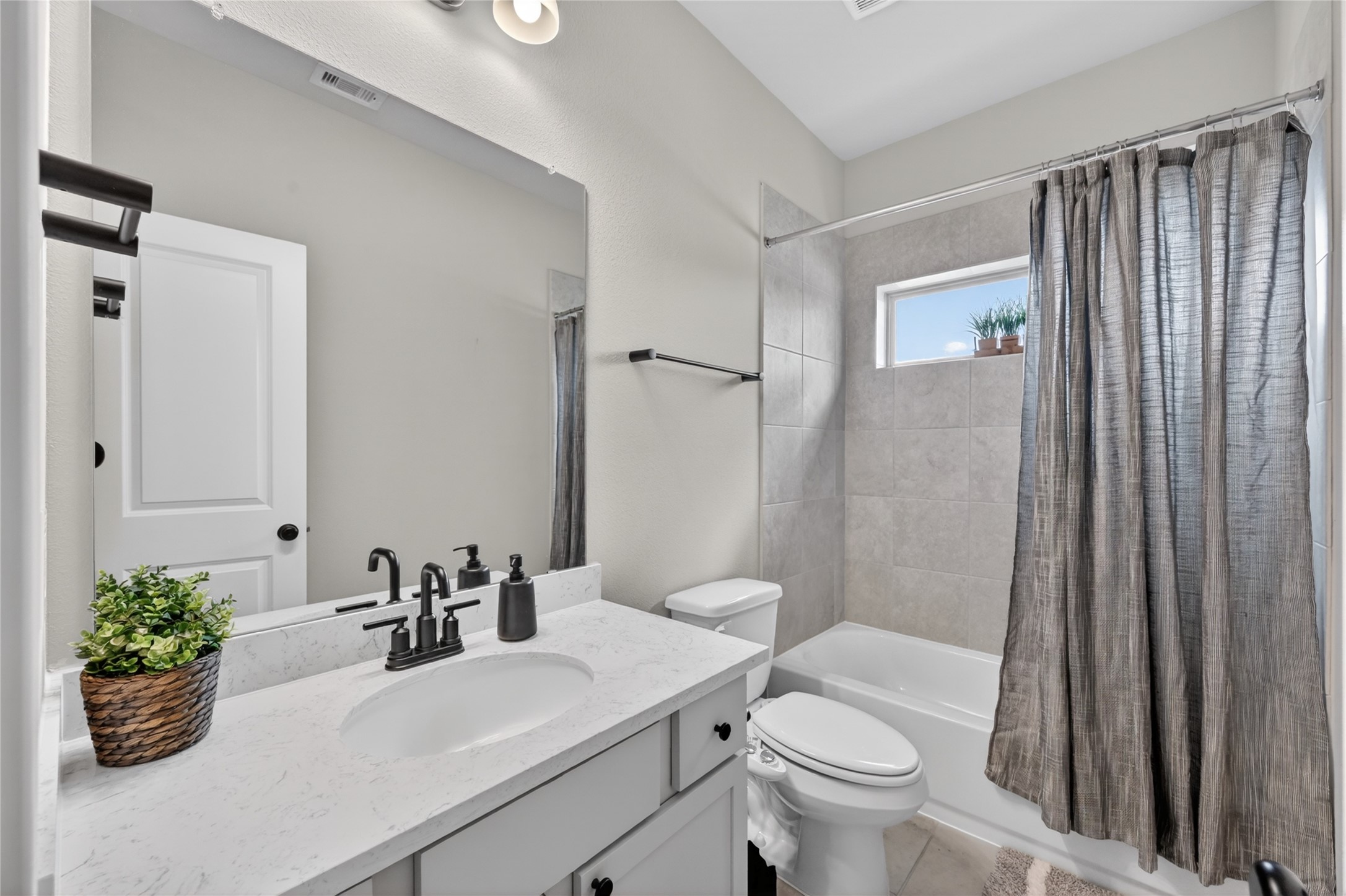 4731 Cedar Butte Lane Manvel, TX 77578 - Photo 28 of 42 a bathroom with a sink toilet and shower
