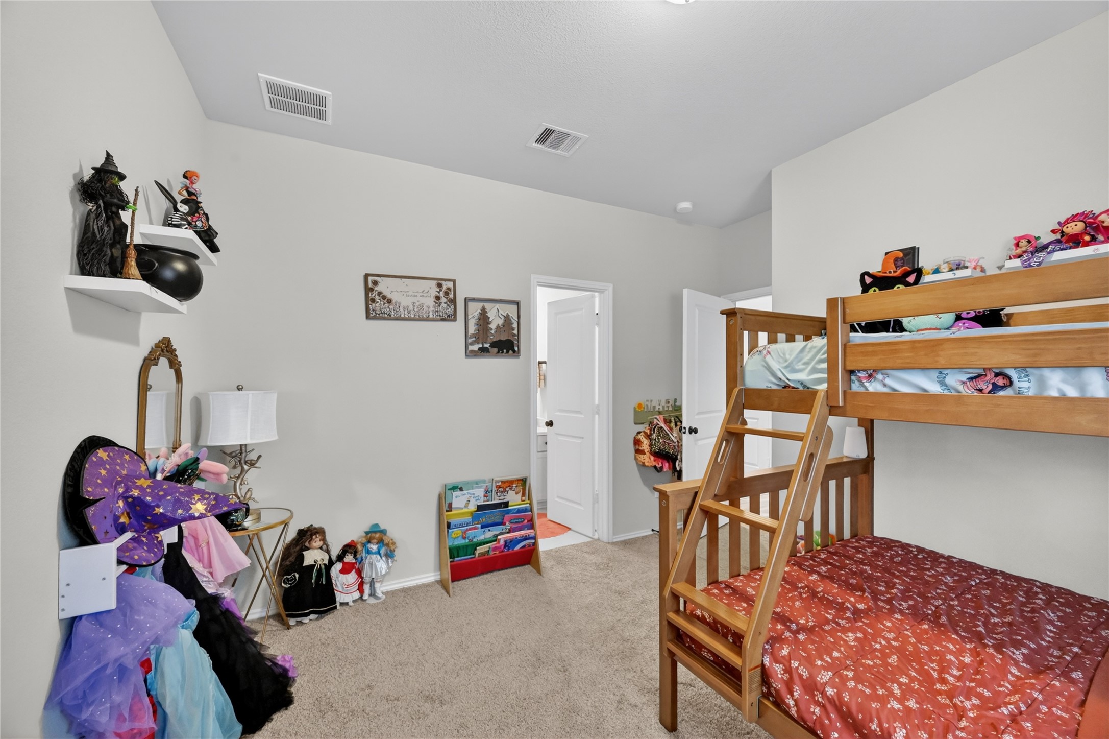 4731 Cedar Butte Lane Manvel, TX 77578 - Photo 30 of 42 a bedroom with furniture and workout equipment