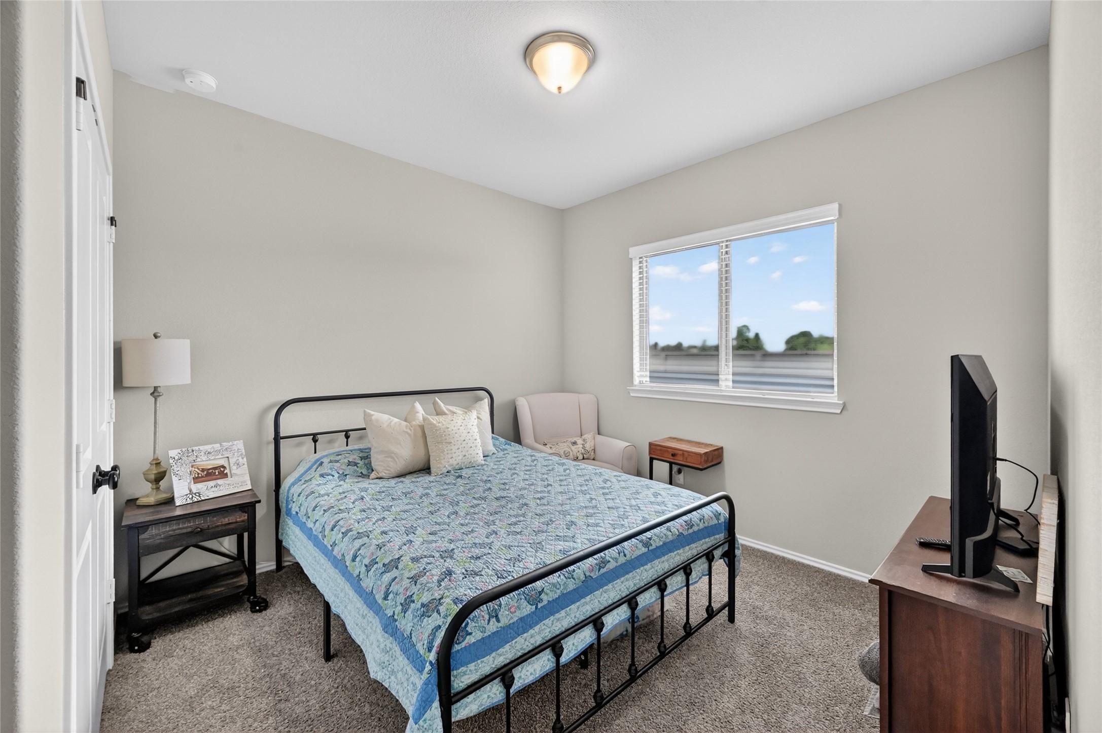 4731 Cedar Butte Lane Manvel, TX 77578 - Photo 32 of 42 a bedroom with furniture and a window